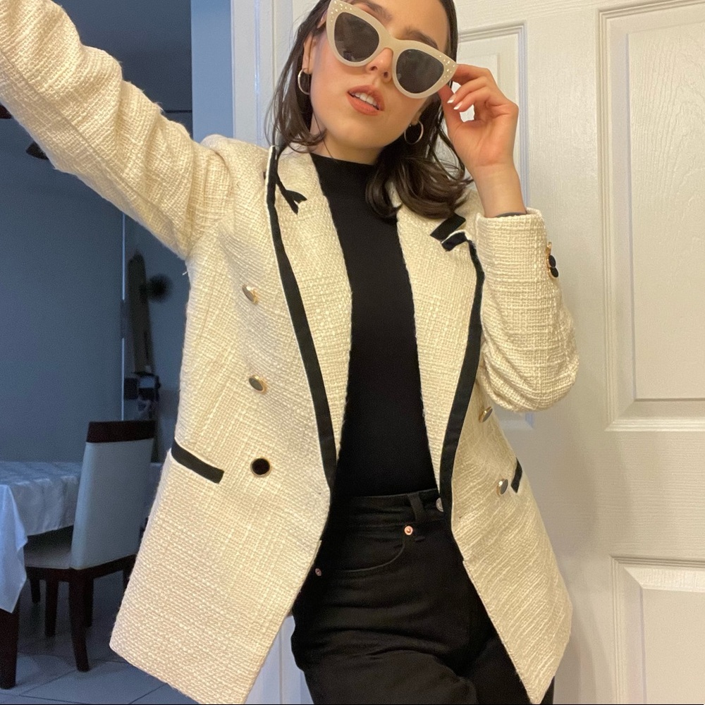 White and black blazer